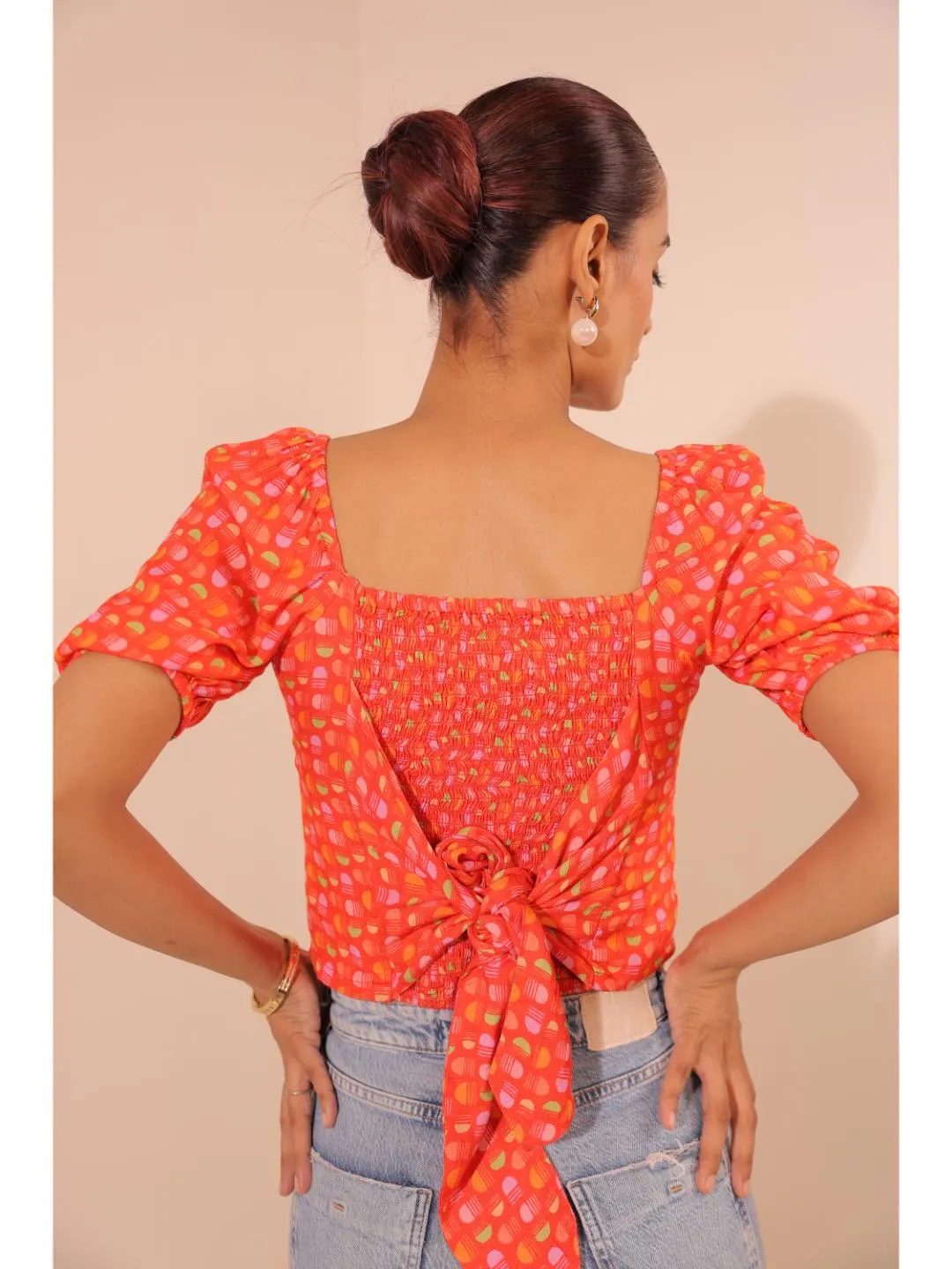 graceful moss crepe printed square neck, raglan puff sleeve with elastic back smocking alongwith stylish bow top - Red